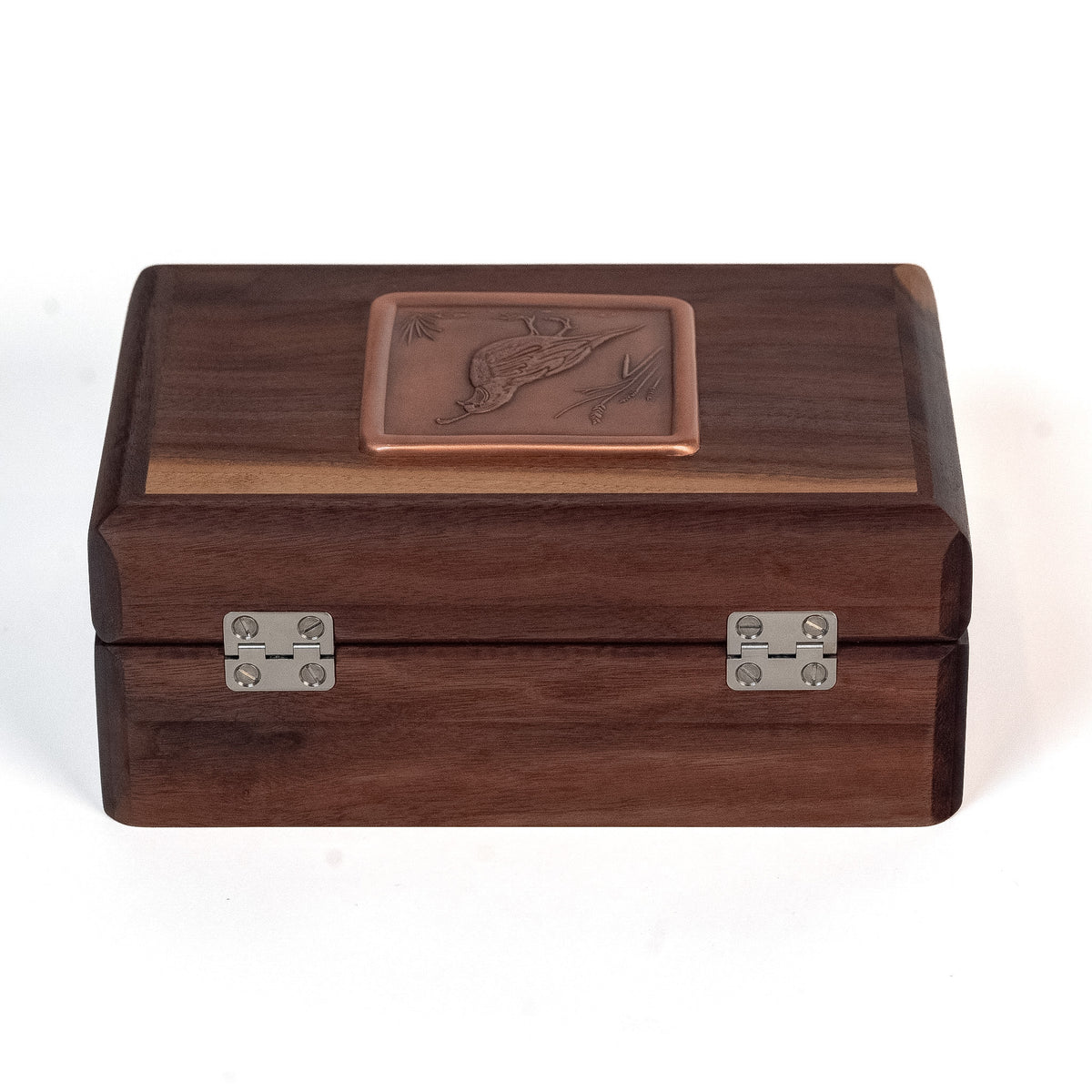 A humidor with a dark brown wood grain finish, featuring a copper-toned engraved lid plaque and two silver metal hinge clasps, shown on a white background.