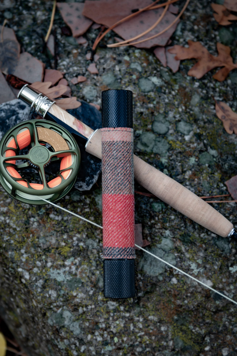 Waterproof cigar tube with fly fishing rod and reel.