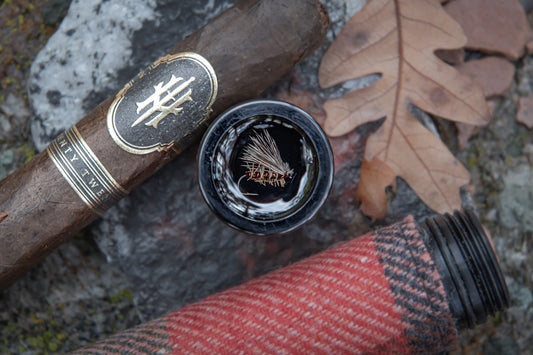 Waterproof cigar tube for fly fishing.